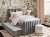 What are the key features of the Angela Velvet Trundle Bed in Twin?